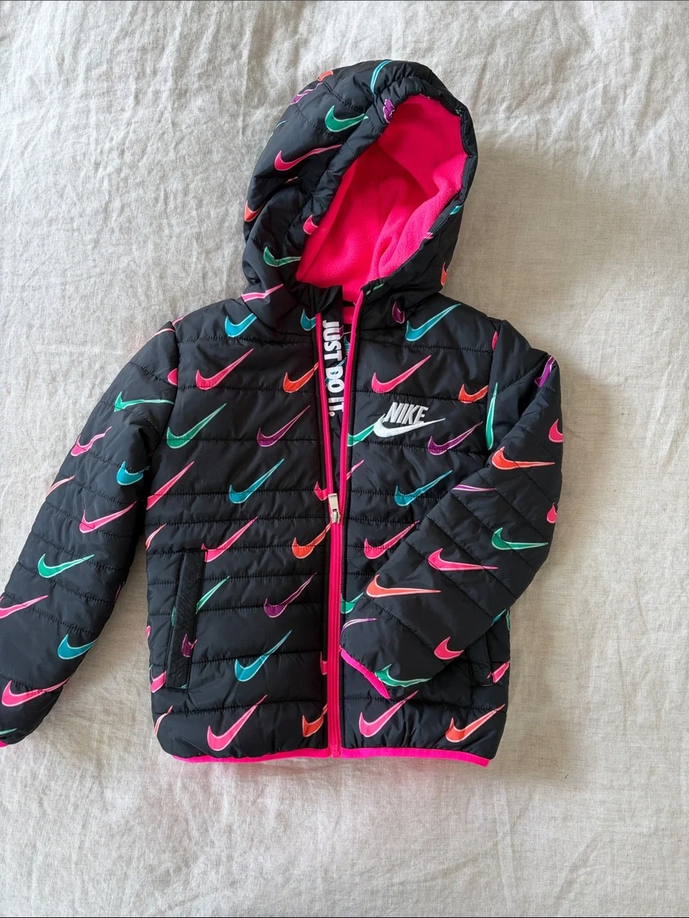 Nike Black Puffer Jacket with Multicolor Swooshes and Hot Pink Lining